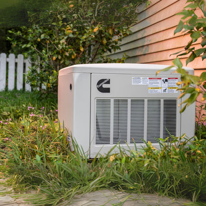 Cummins RS17A 17kW Home Standby Generator front view installed in the backyard