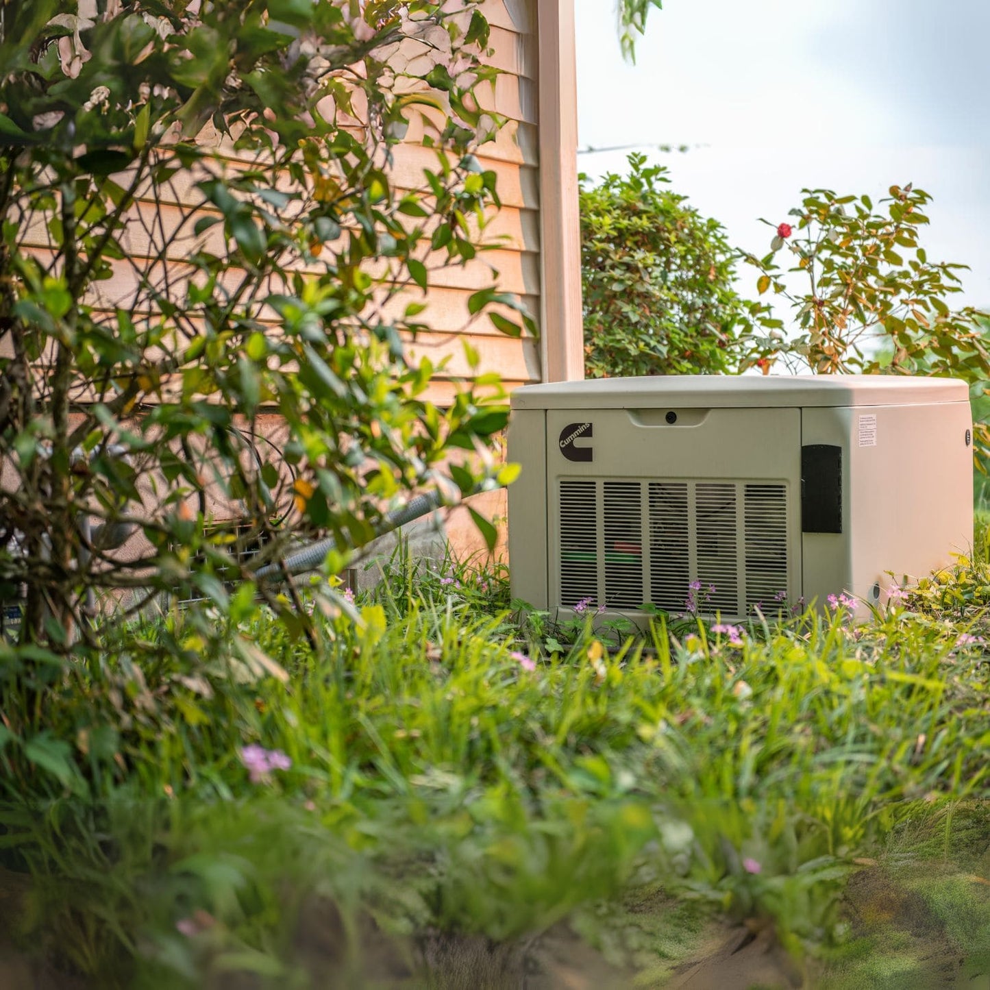 Cummins RS20A 20kW Home Standby Generator installed in the backyard 