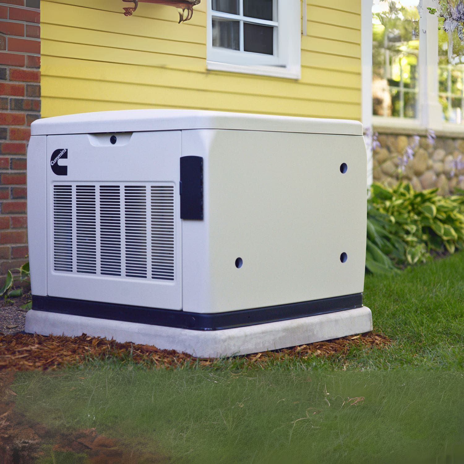 Cummins RS20A 20kW Home Standby Generator installed on backyard ground