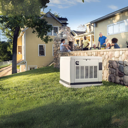 Cummins RS20A 20kW Home Standby Generator outside the yard with six people nearby