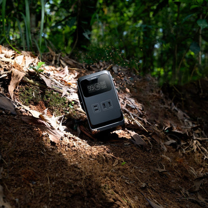 EcoFlow TRAIL 200DC Portable Power Station on a forest floor