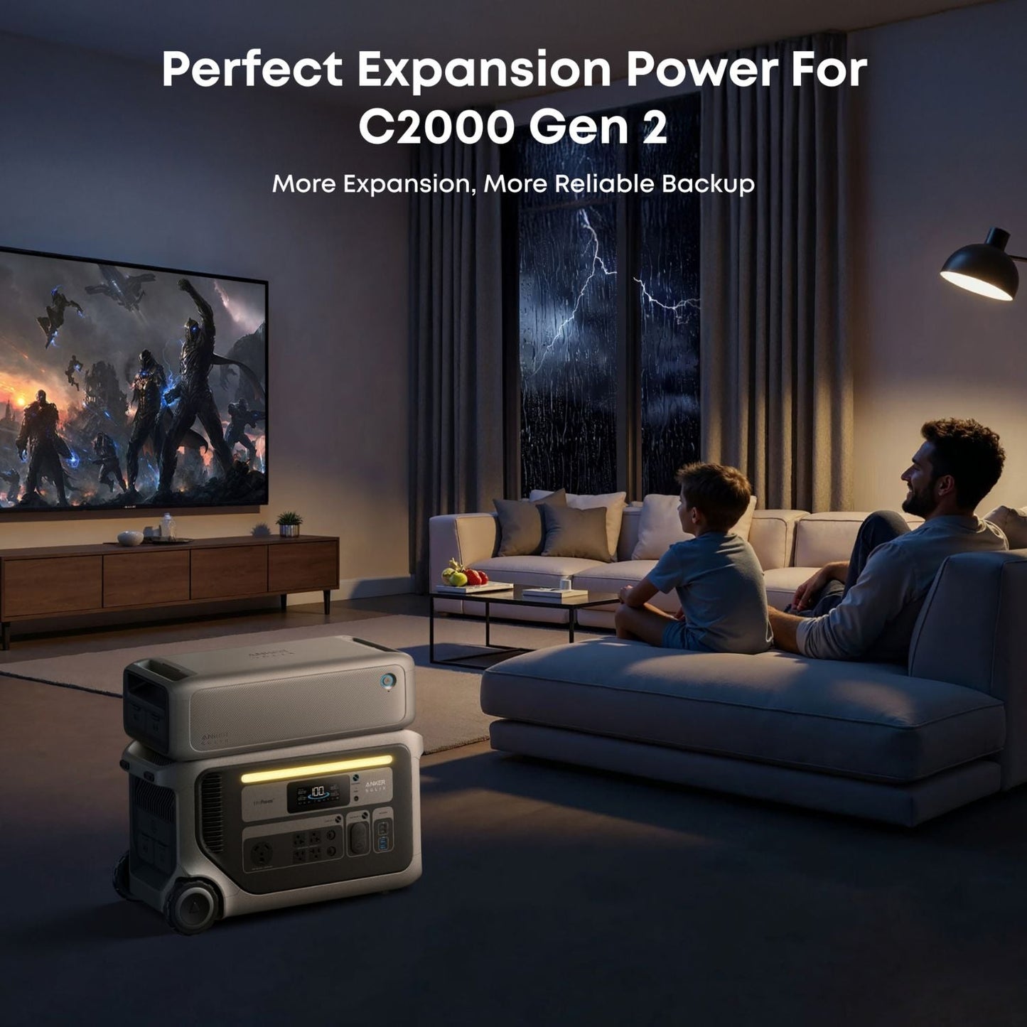 Living room with a family sitting on a couch, a TV on the left, and a Anker SOLIX C2000 Gen 2 Expansion Battery