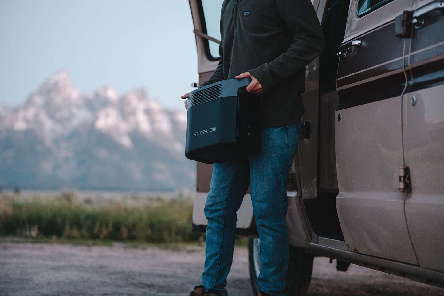 Man Holding An EcoFlow DELTA 2 Outdoors In Wyoming