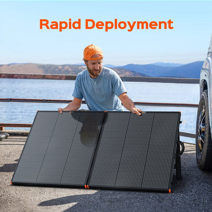 Man holding open Rich Solar Mega 200W Portable Solar Panel Briefcase 